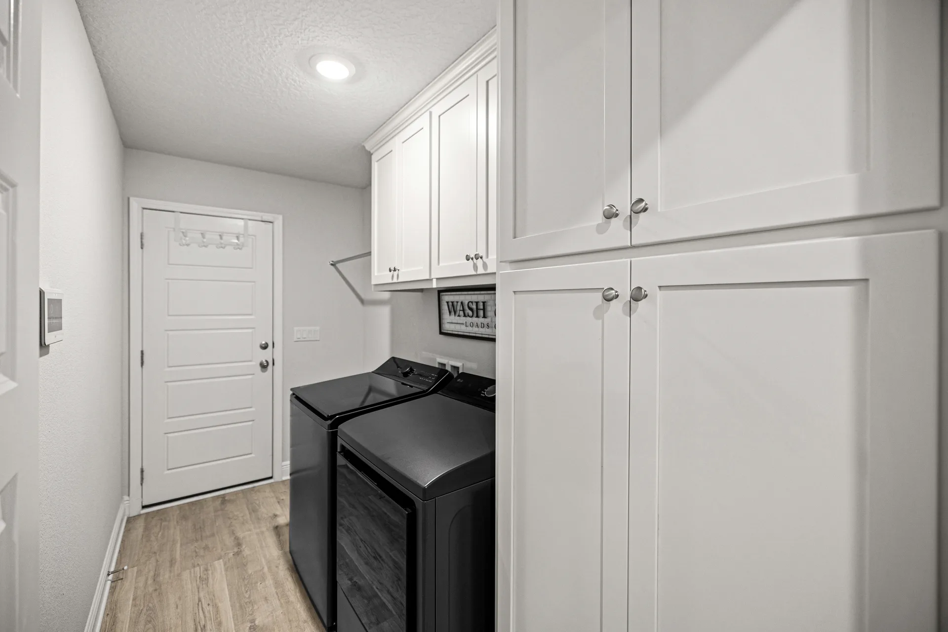 Laundry room by Joy Signature Designs
