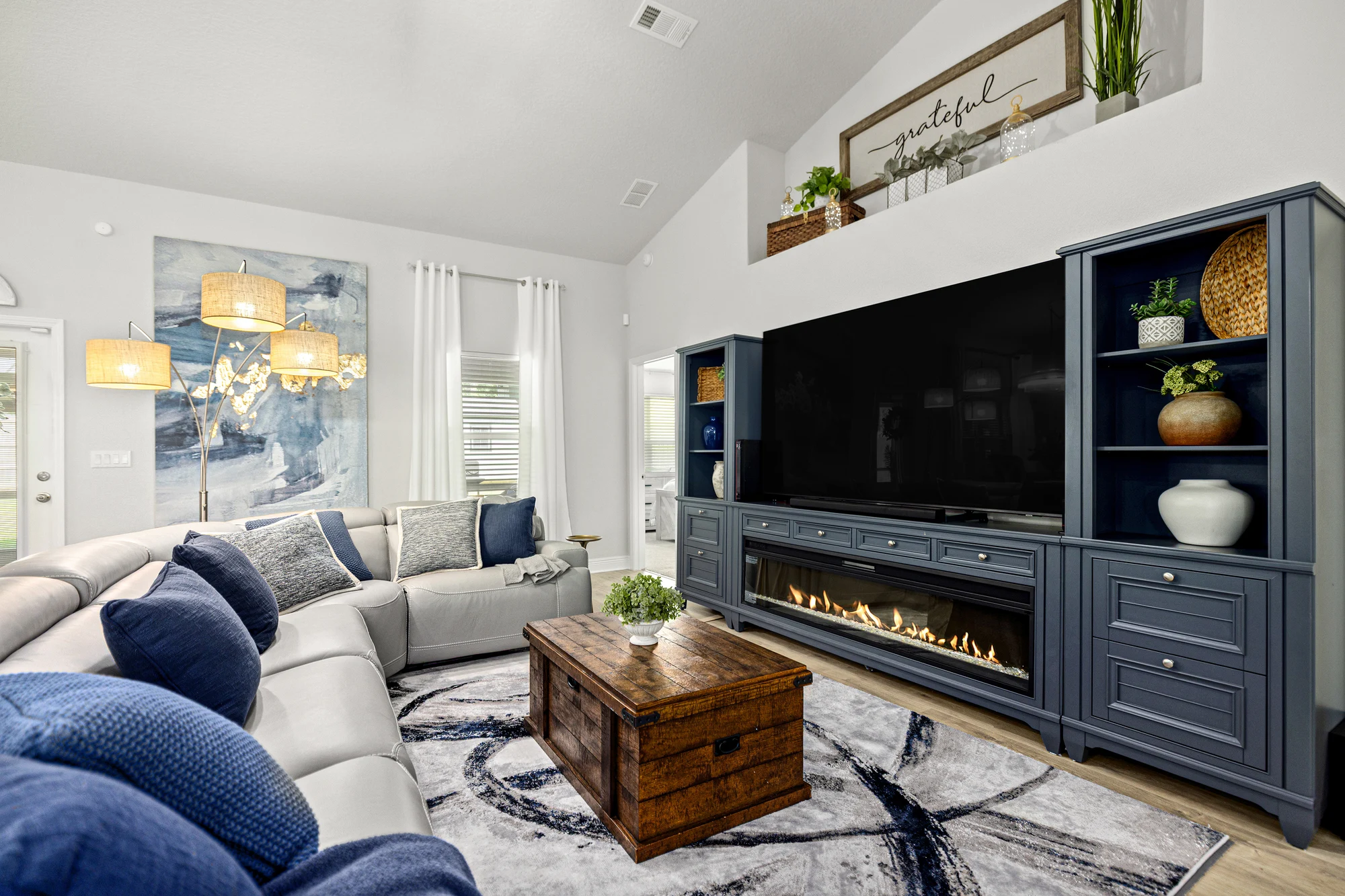 Living room redesign by Joy Signature Designs